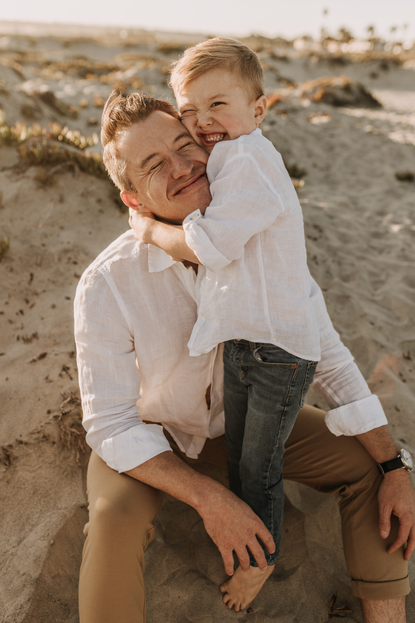 San Diego family photos warm sunset beach photos family of four candid family moments golden hour light beach San Diego family photographer Sabrina Kinsella