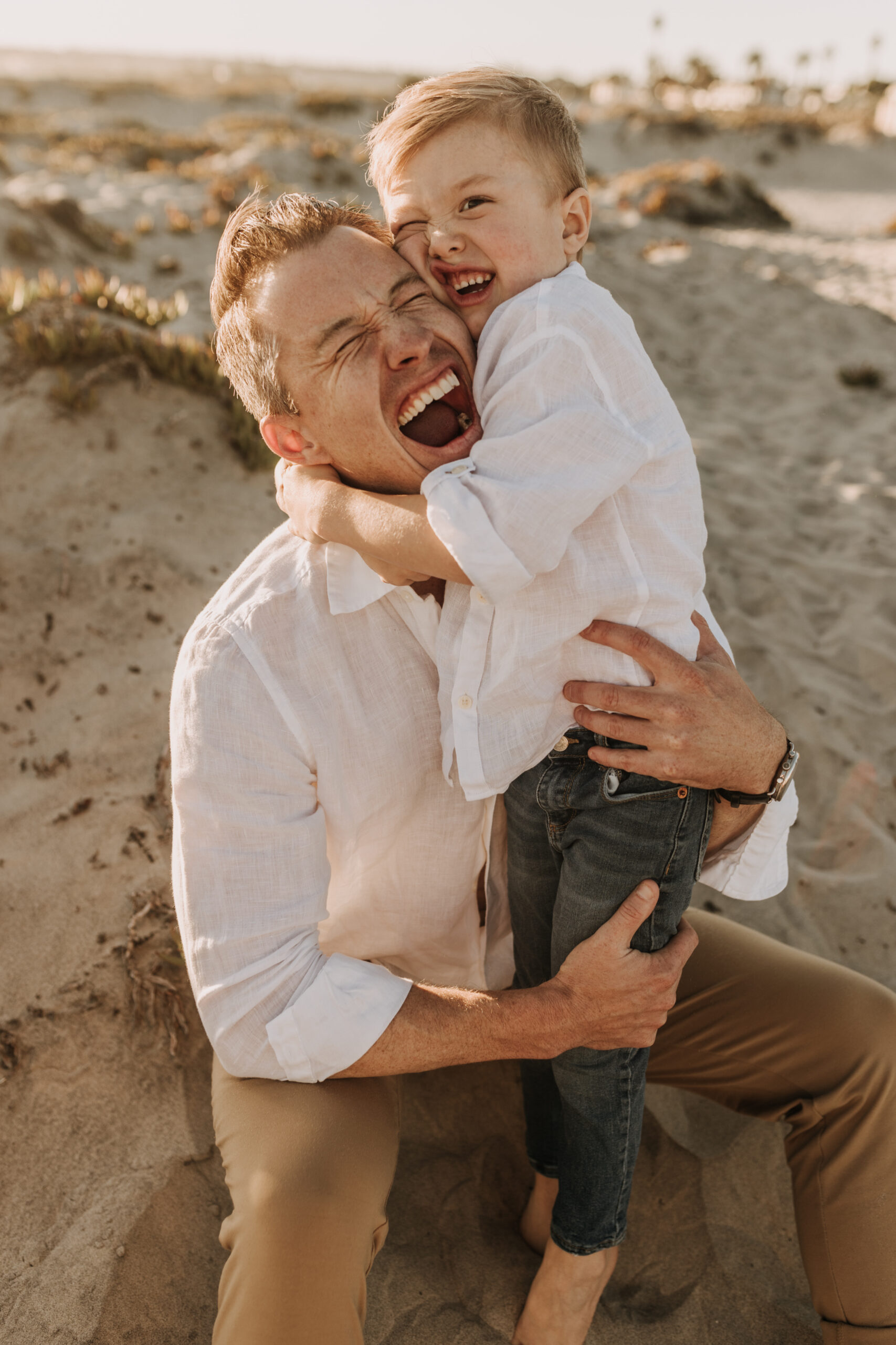 San Diego family photos warm sunset beach photos family of four candid family moments golden hour light beach San Diego family photographer Sabrina Kinsella