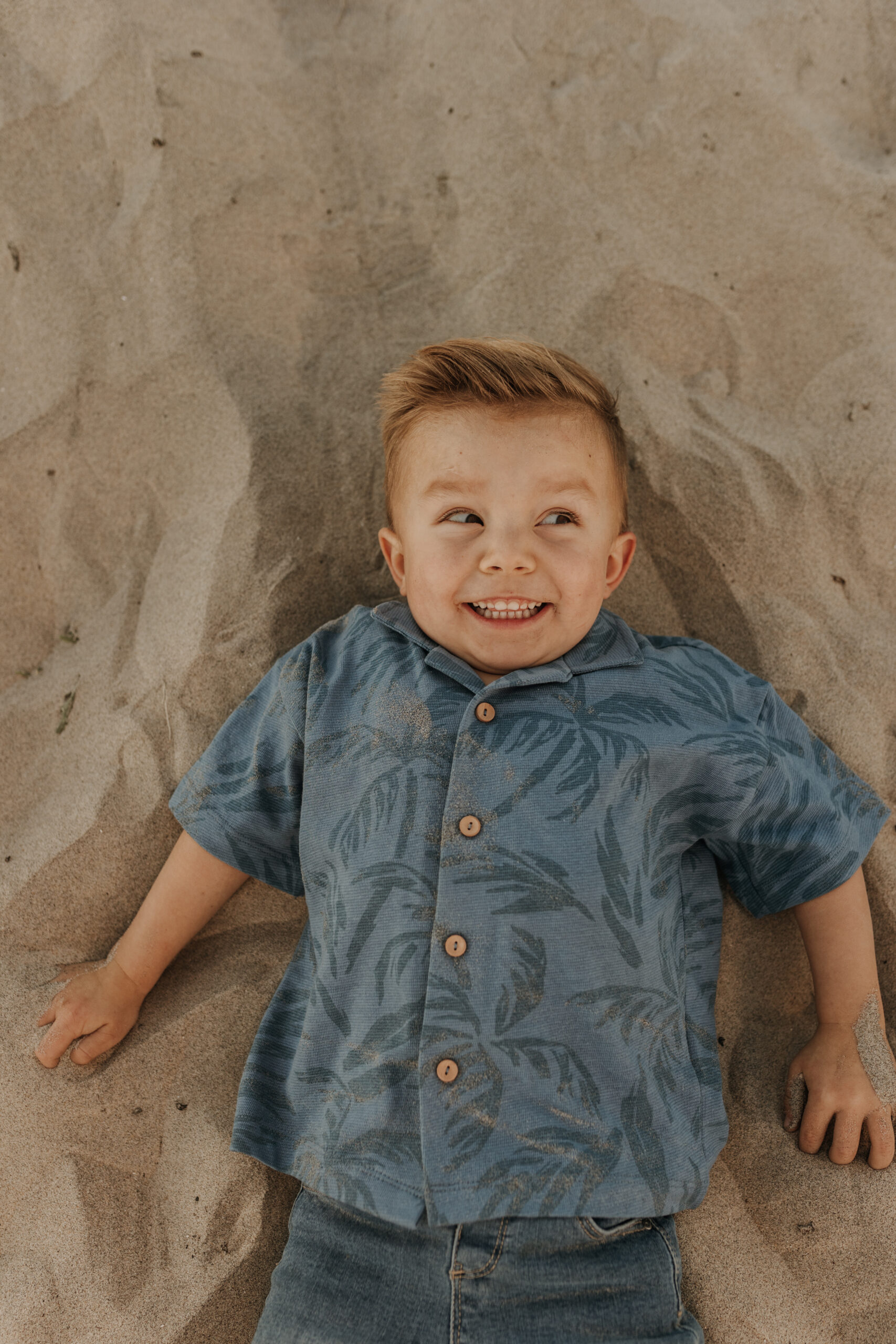 San Diego family photos warm sunset beach photos family of four candid family moments golden hour light beach San Diego family photographer Sabrina Kinsella