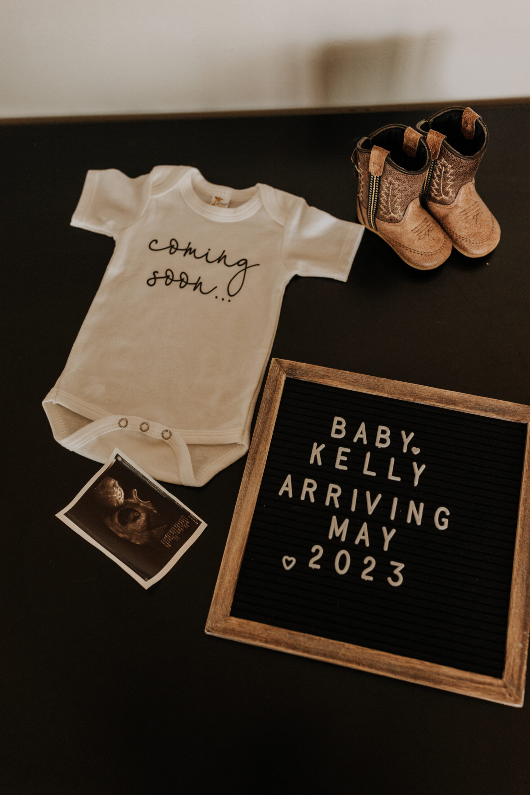 in home San Diego pregnancy reveal photos maternity photos couple in home ultrasound love reveal baby pregnancy San Diego family photographer Sabrina kinsella