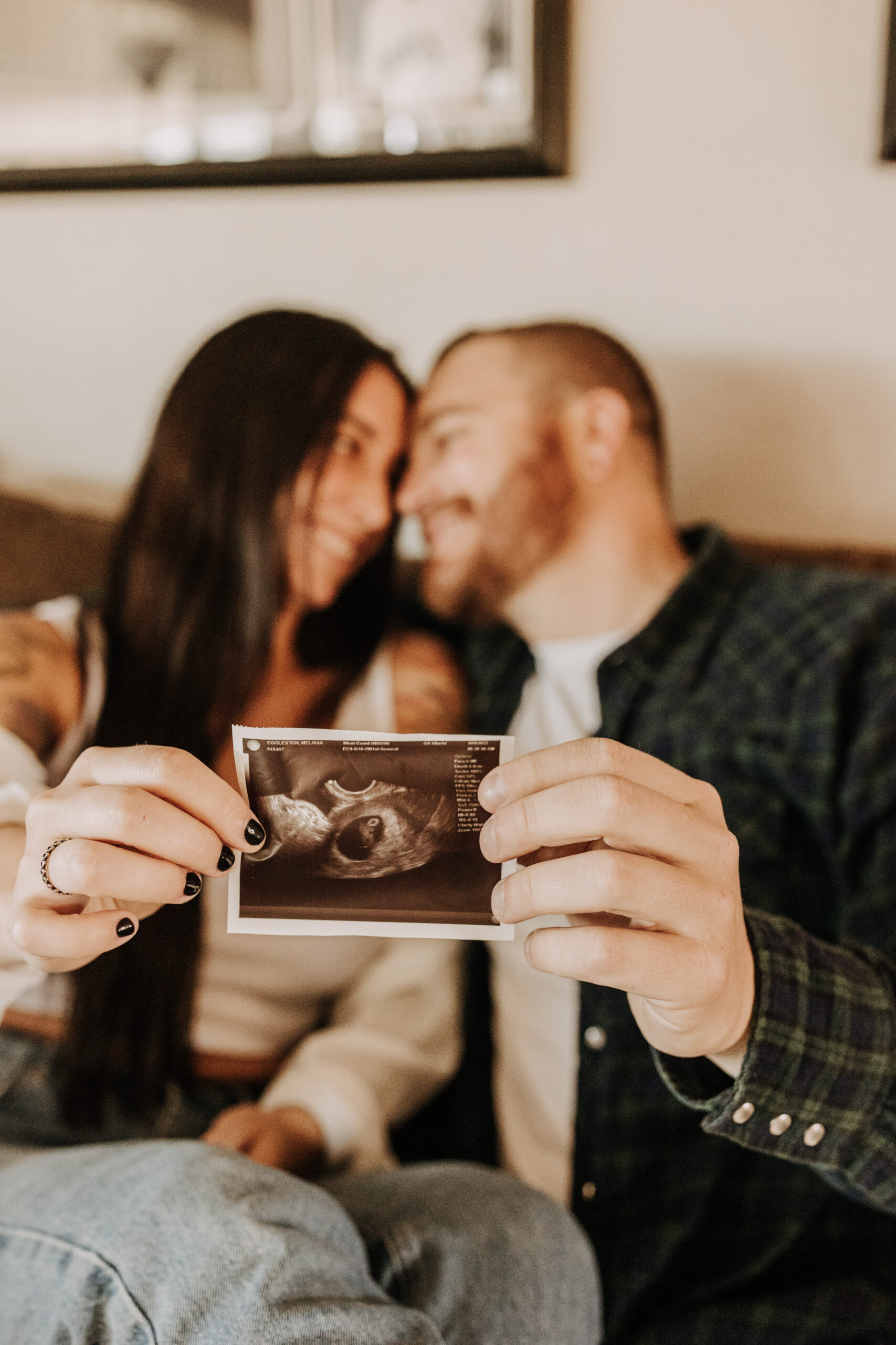 in home San Diego pregnancy reveal photos maternity photos couple in home ultrasound love reveal baby pregnancy San Diego family photographer Sabrina kinsella