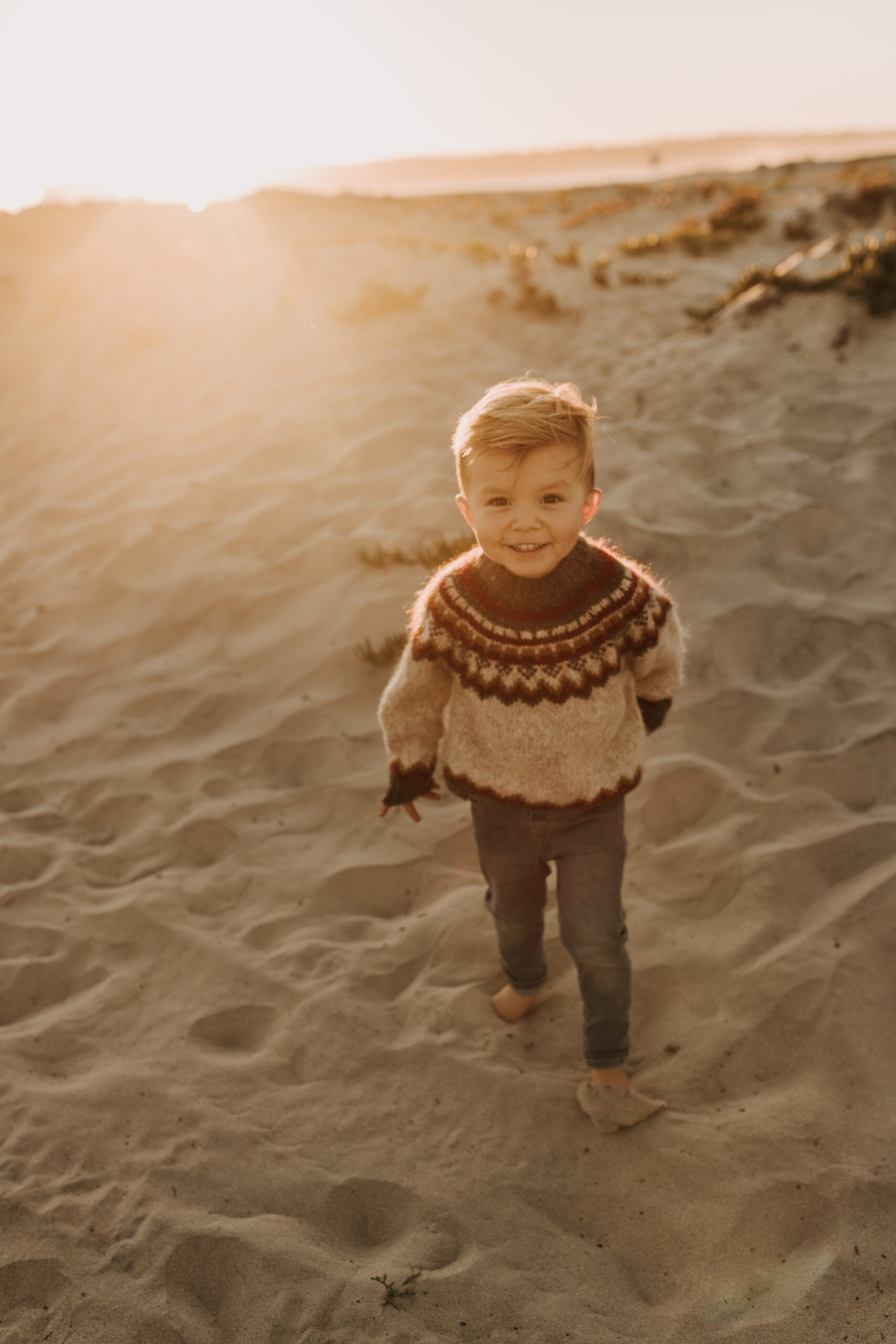 San Diego family photos warm sunset beach photos family of four candid family moments golden hour light beach San Diego family photographer Sabrina Kinsella