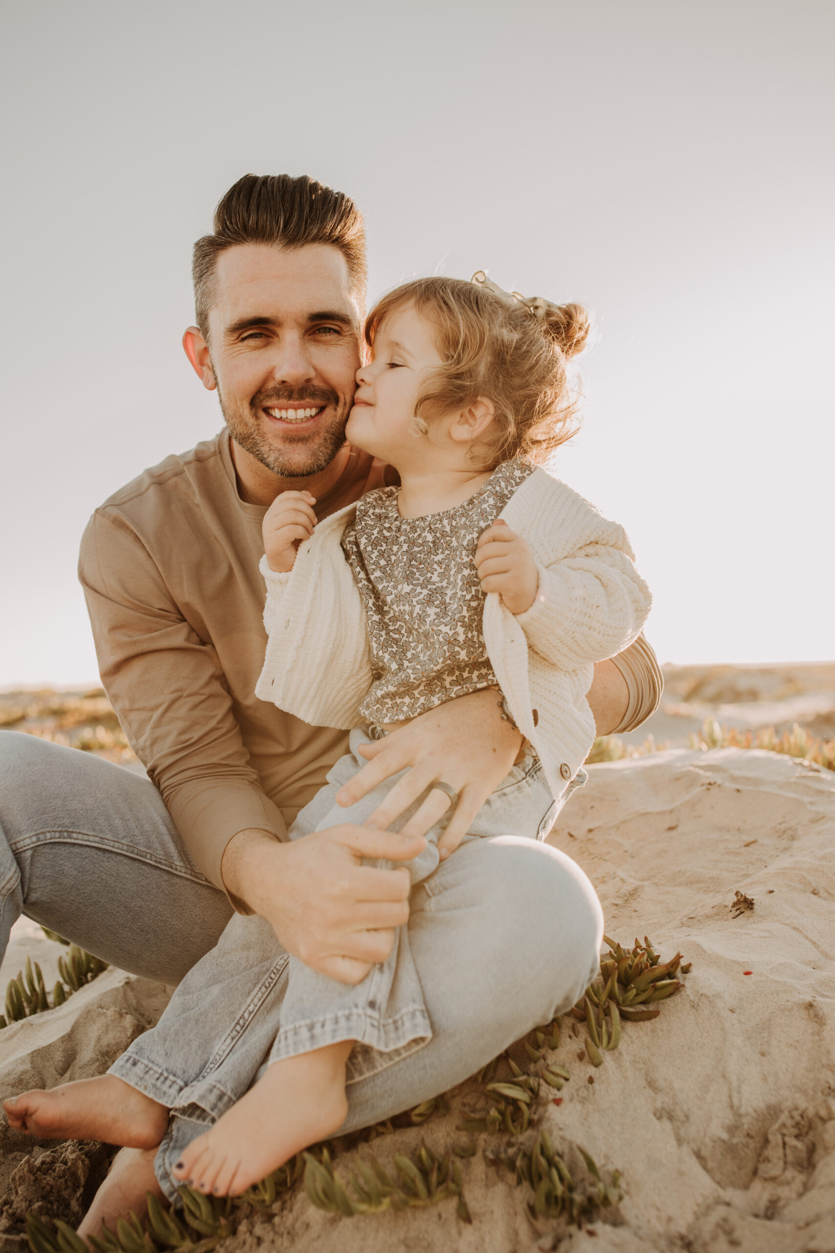 warm neutral sunset beach photos family photos on the beach golden hour family of four candid family photos love San Diego family photographer Sabrina kinsella