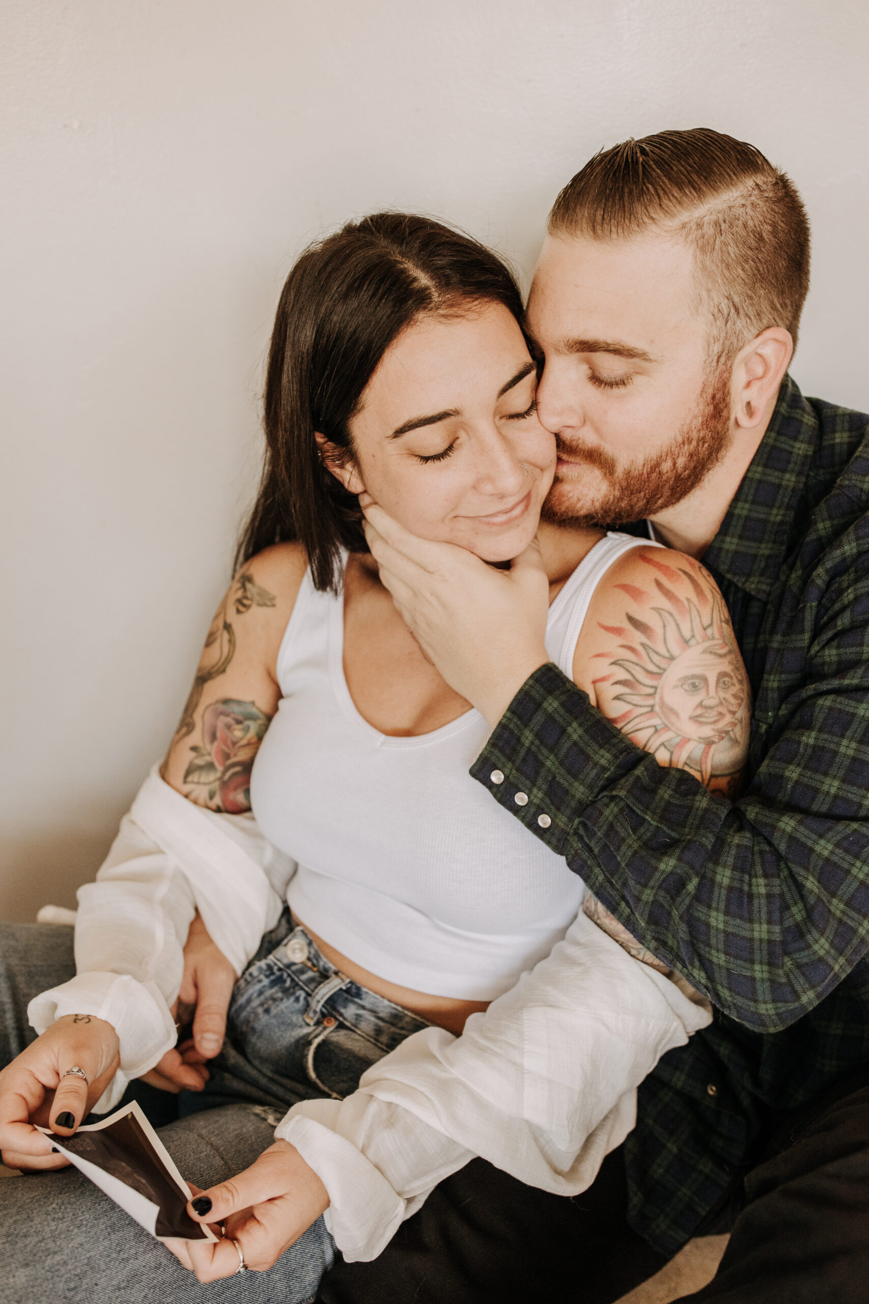 in home San Diego pregnancy reveal photos maternity photos couple in home ultrasound love reveal baby pregnancy San Diego family photographer Sabrina kinsella