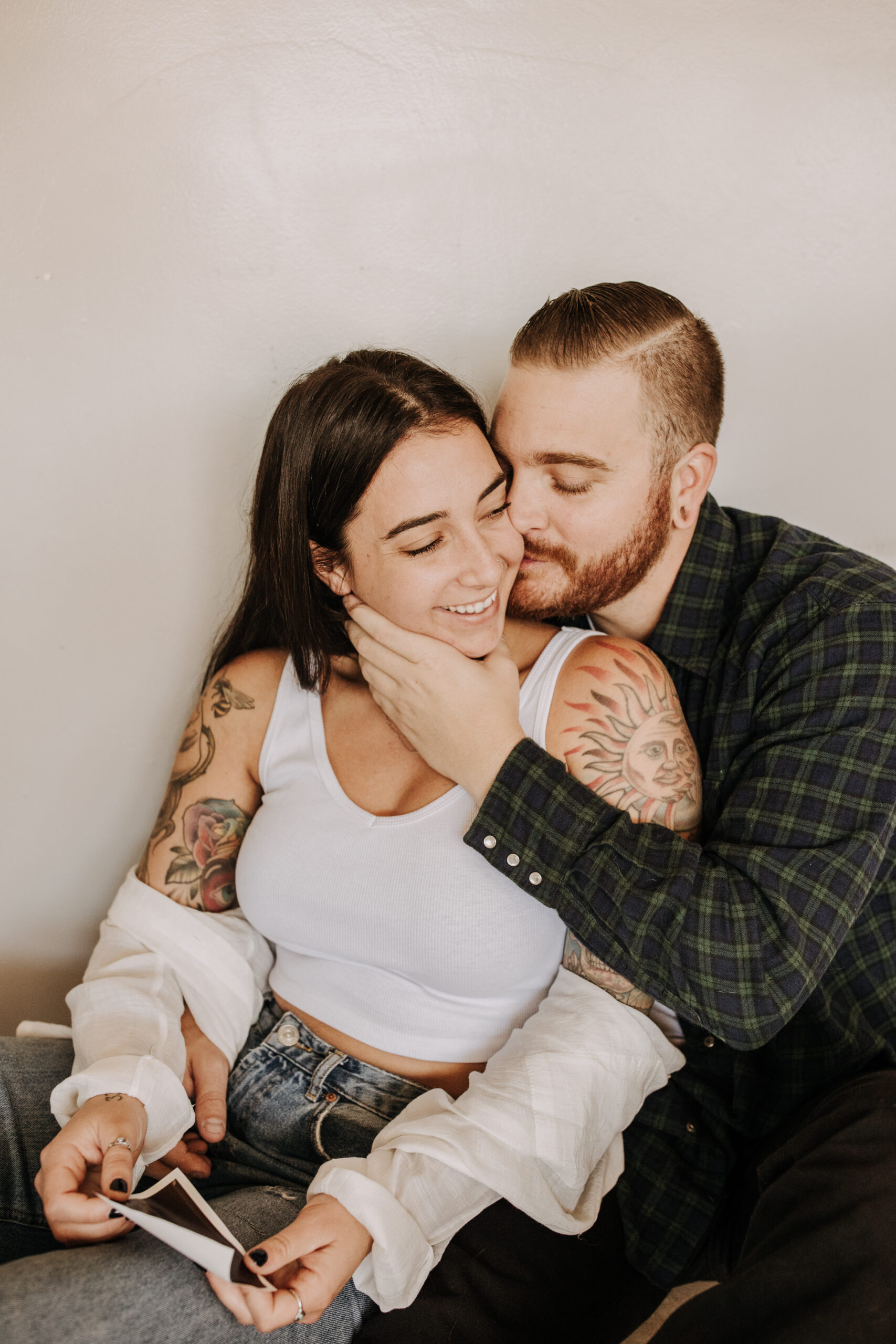 in home San Diego pregnancy reveal photos maternity photos couple in home ultrasound love reveal baby pregnancy San Diego family photographer Sabrina kinsella