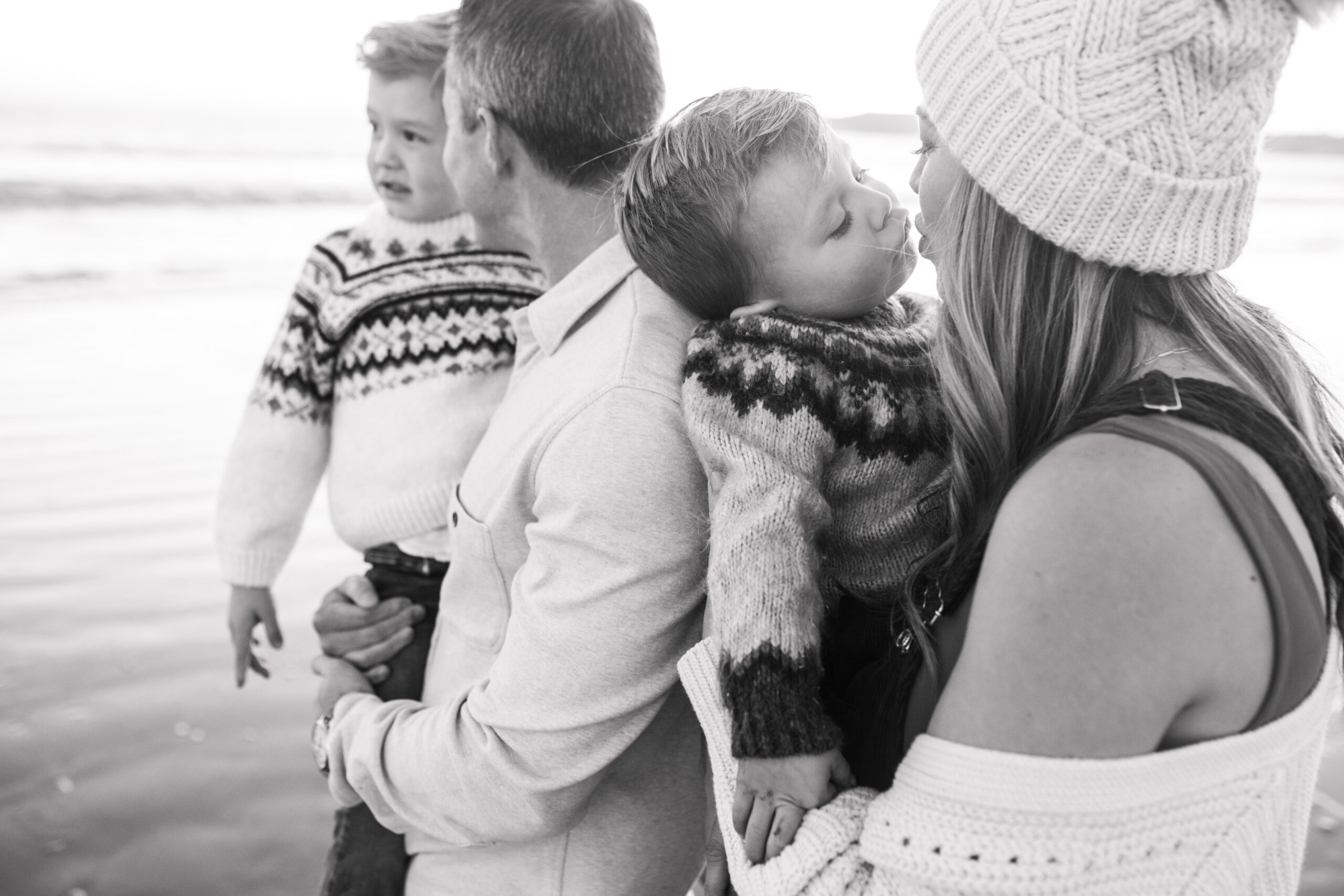 San Diego family photos warm sunset beach photos family of four candid family moments golden hour light beach San Diego family photographer Sabrina Kinsella