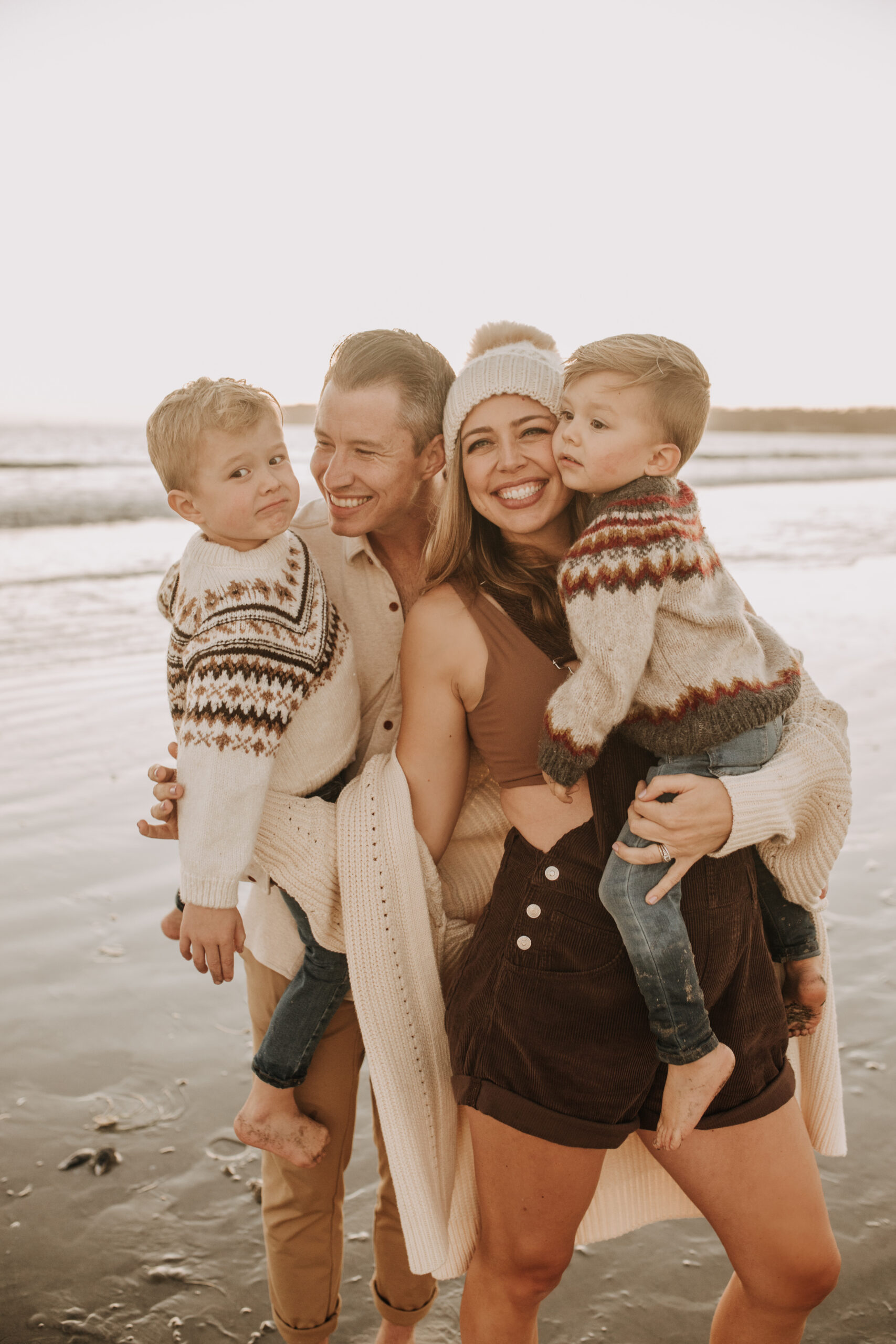 San Diego family photos warm sunset beach photos family of four candid family moments golden hour light beach San Diego family photographer Sabrina Kinsella