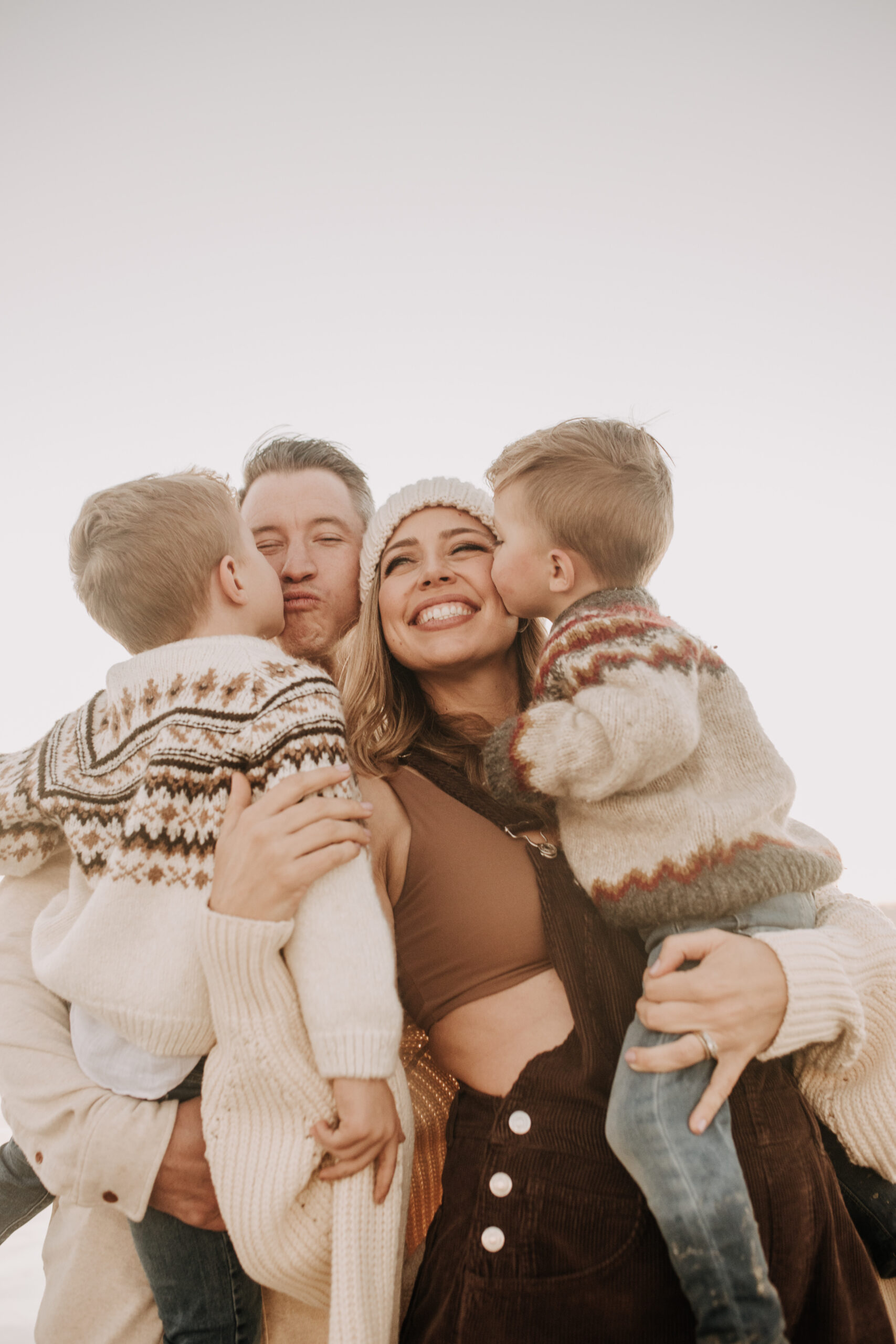 San Diego family photos warm sunset beach photos family of four candid family moments golden hour light beach San Diego family photographer Sabrina Kinsella