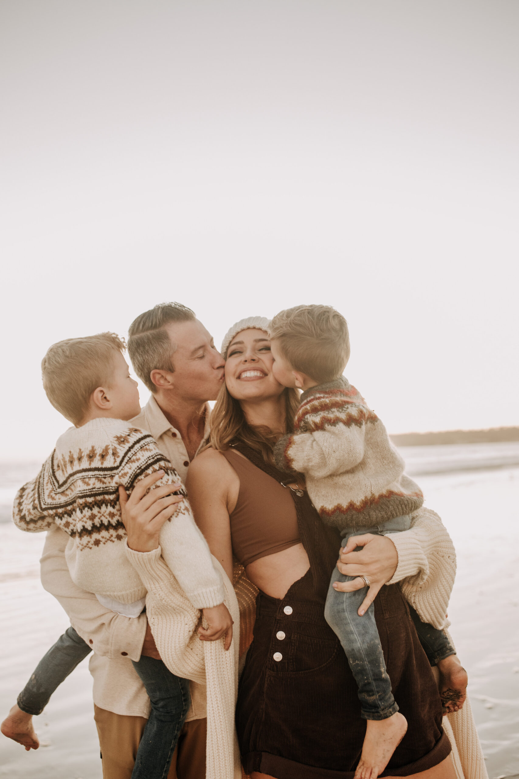 San Diego family photos warm sunset beach photos family of four candid family moments golden hour light beach San Diego family photographer Sabrina Kinsella