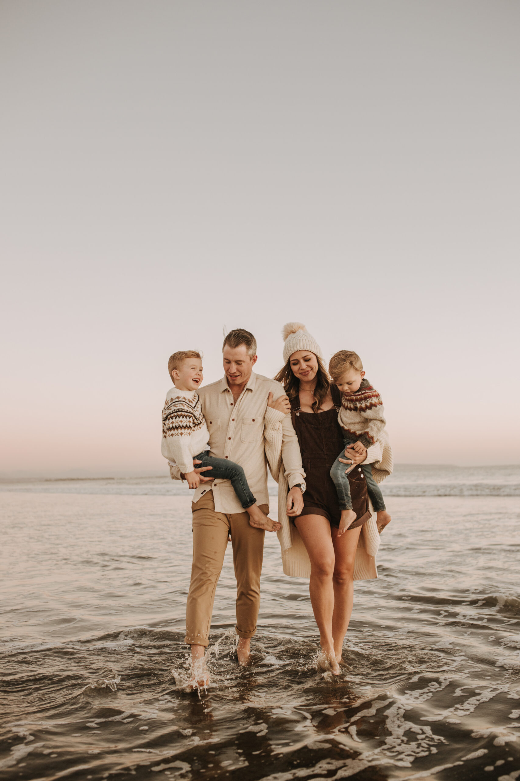 San Diego family photos warm sunset beach photos family of four candid family moments golden hour light beach San Diego family photographer Sabrina Kinsella