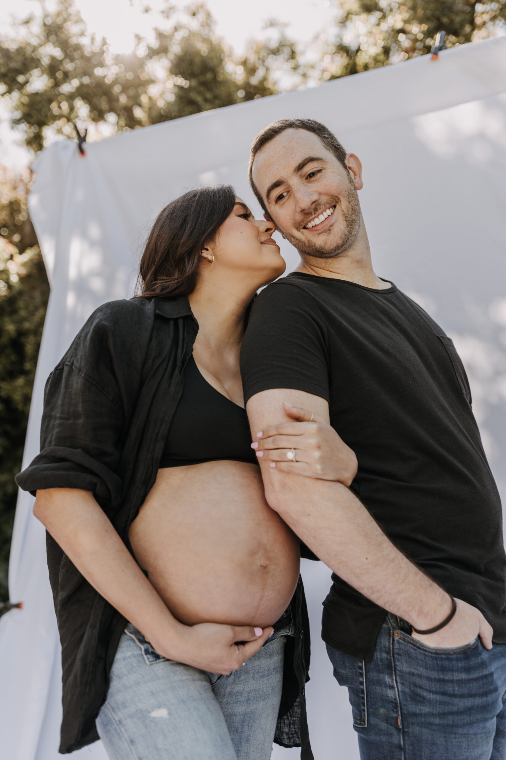 backyard mini maternity session maternity photos white backdrop sabrinalynnphoto San Diego couples photographer florals