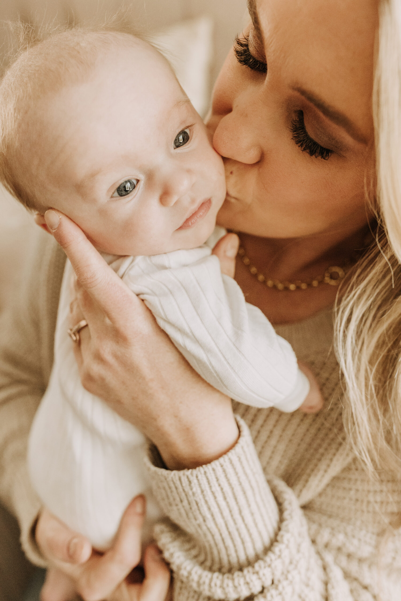 in home newborn baby photos San Diego at home infant family photos candid family moments warm cream neutral toned baby pictures newborn San Diego family photographer Sabrina kinsella sabrinalynnphoto