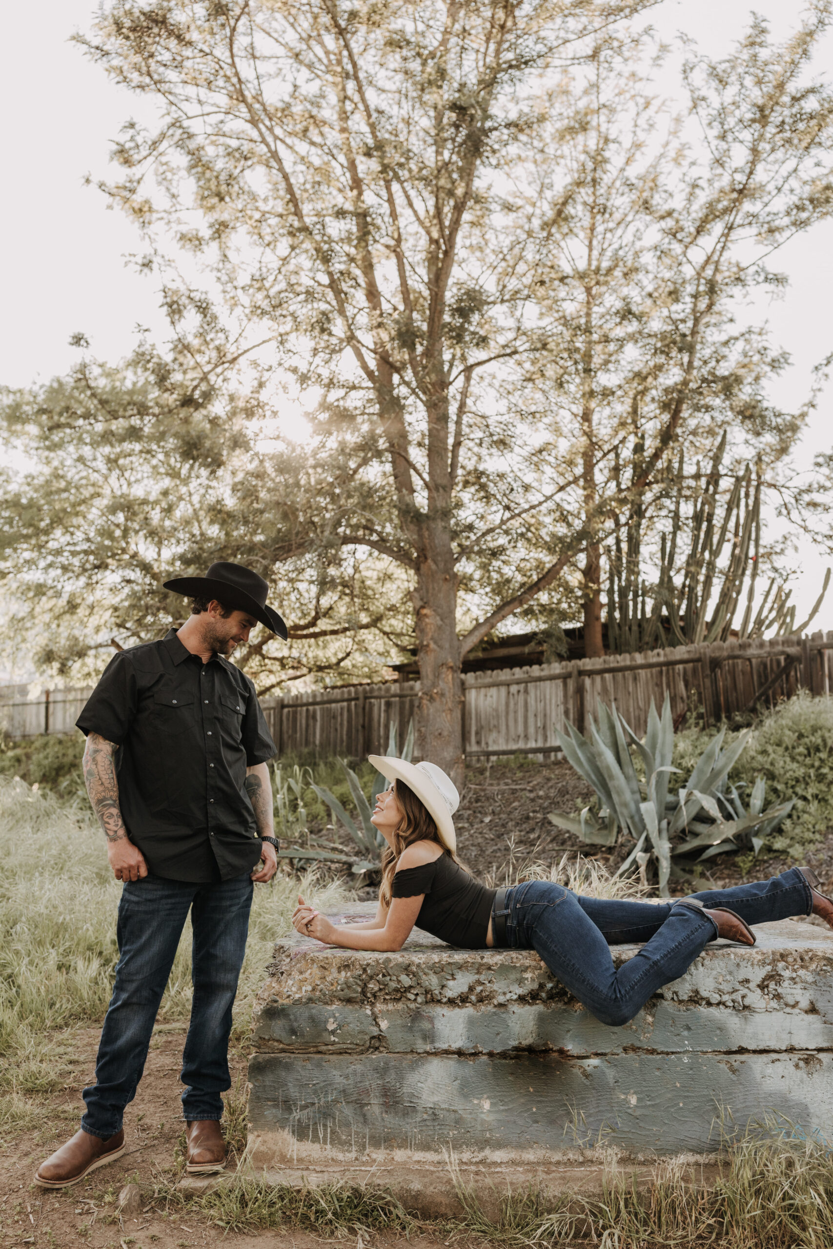 outdoor western romantic engagement session couples photography warm toned country cowboy modern couple bride and groom engagement San Diego couples photographer Sabrina kinsella sabrinalynnphoto