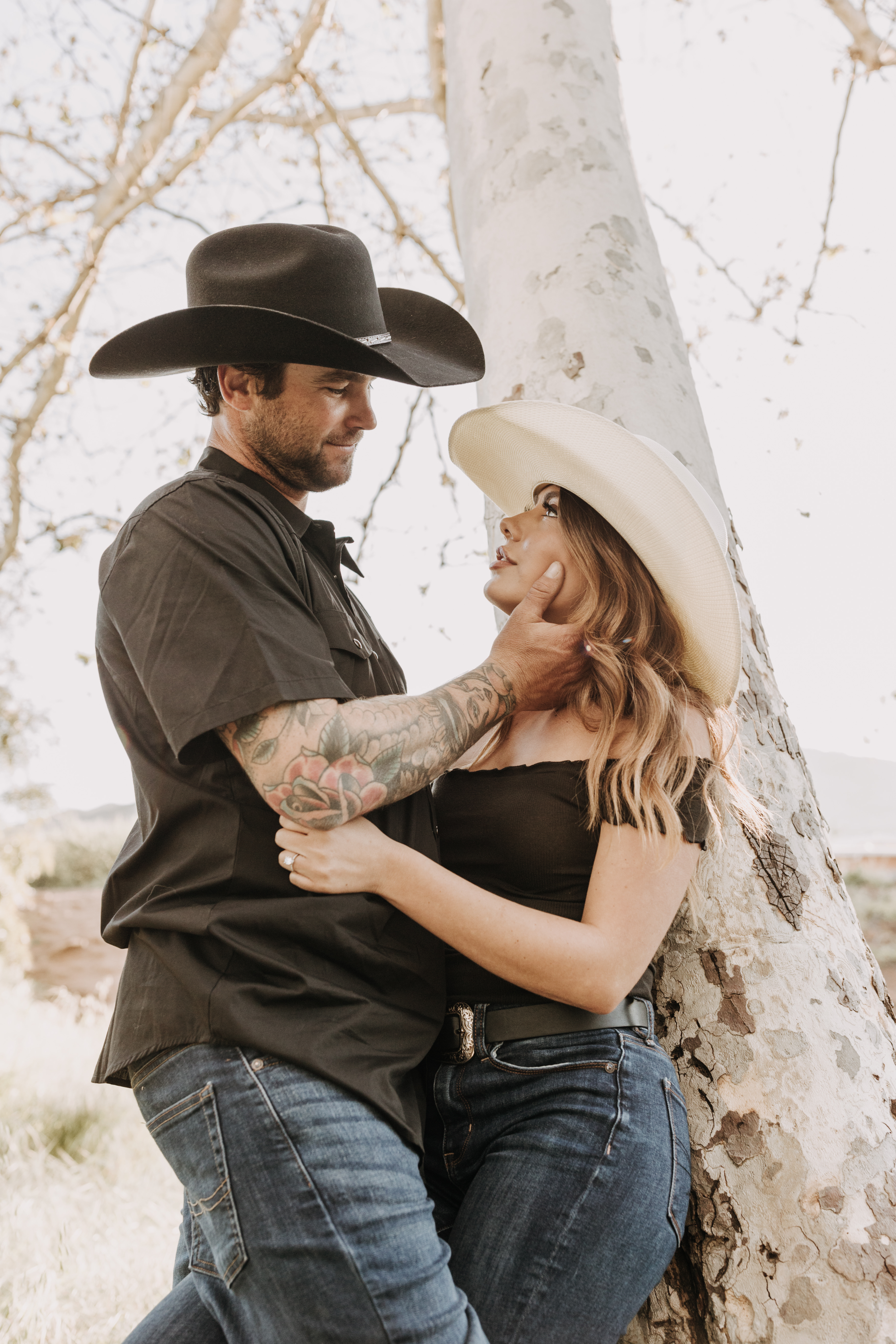 outdoor western romantic engagement session couples photography warm toned country cowboy modern couple bride and groom engagement San Diego couples photographer Sabrina kinsella sabrinalynnphoto