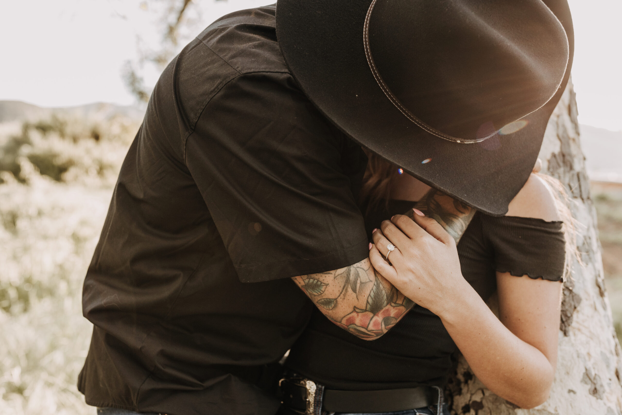 outdoor western romantic engagement session couples photography warm toned country cowboy modern couple bride and groom engagement San Diego couples photographer Sabrina kinsella sabrinalynnphoto