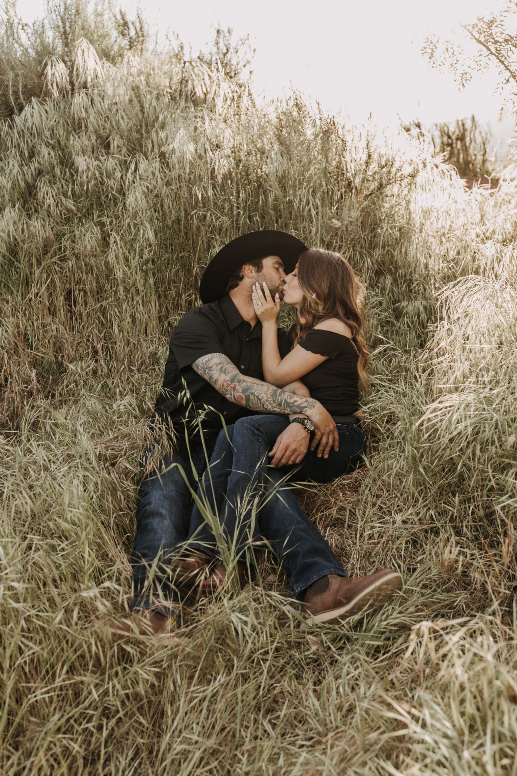 outdoor western romantic engagement session couples photography warm toned country cowboy modern couple bride and groom engagement San Diego couples photographer Sabrina kinsella sabrinalynnphoto