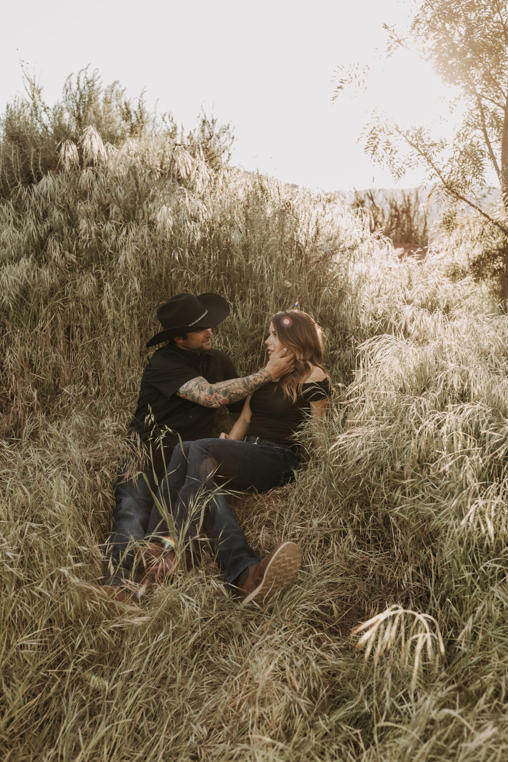 outdoor western romantic engagement session couples photography warm toned country cowboy modern couple bride and groom engagement San Diego couples photographer Sabrina kinsella sabrinalynnphoto