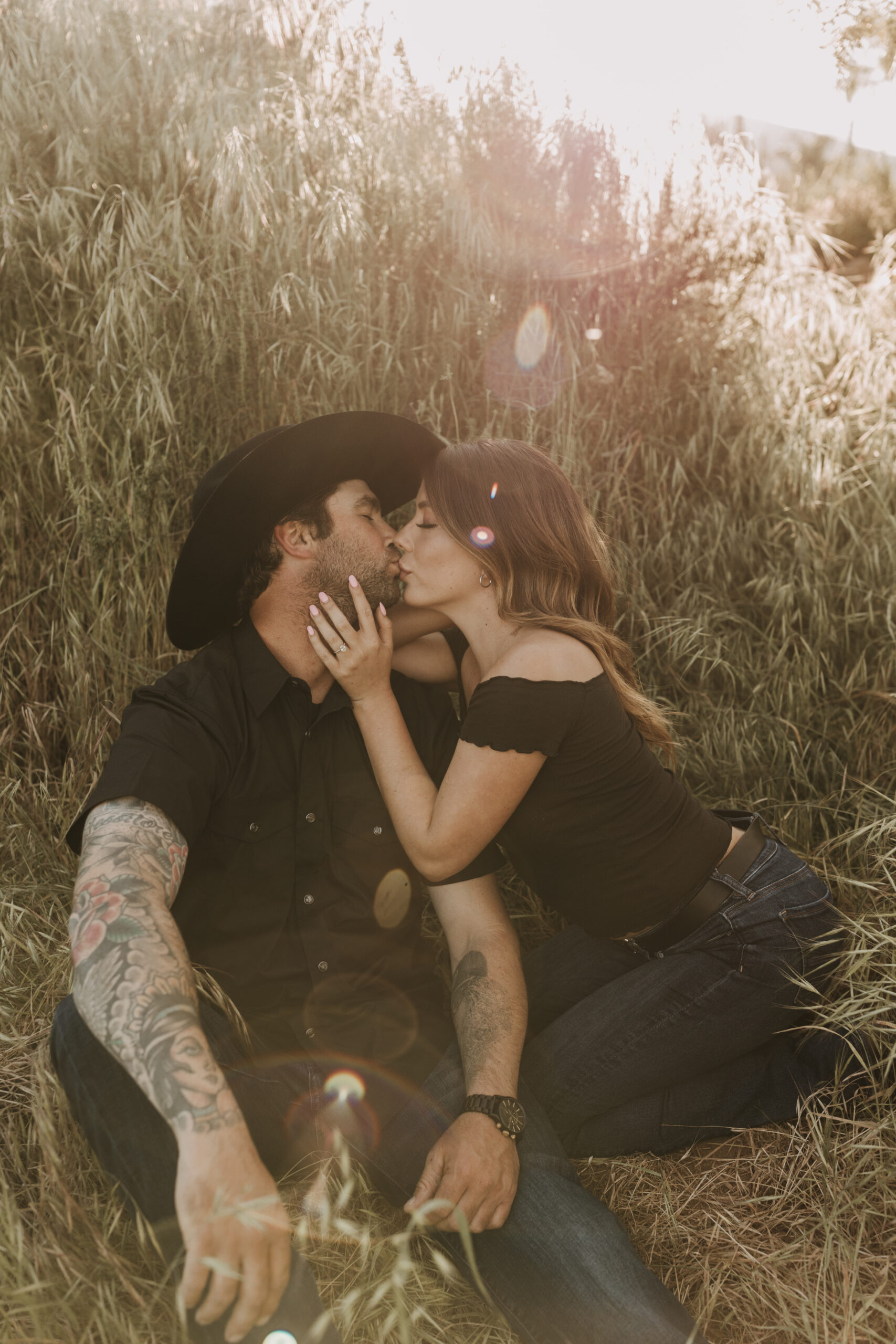 outdoor western romantic engagement session couples photography warm toned country cowboy modern couple bride and groom engagement San Diego couples photographer Sabrina kinsella sabrinalynnphoto