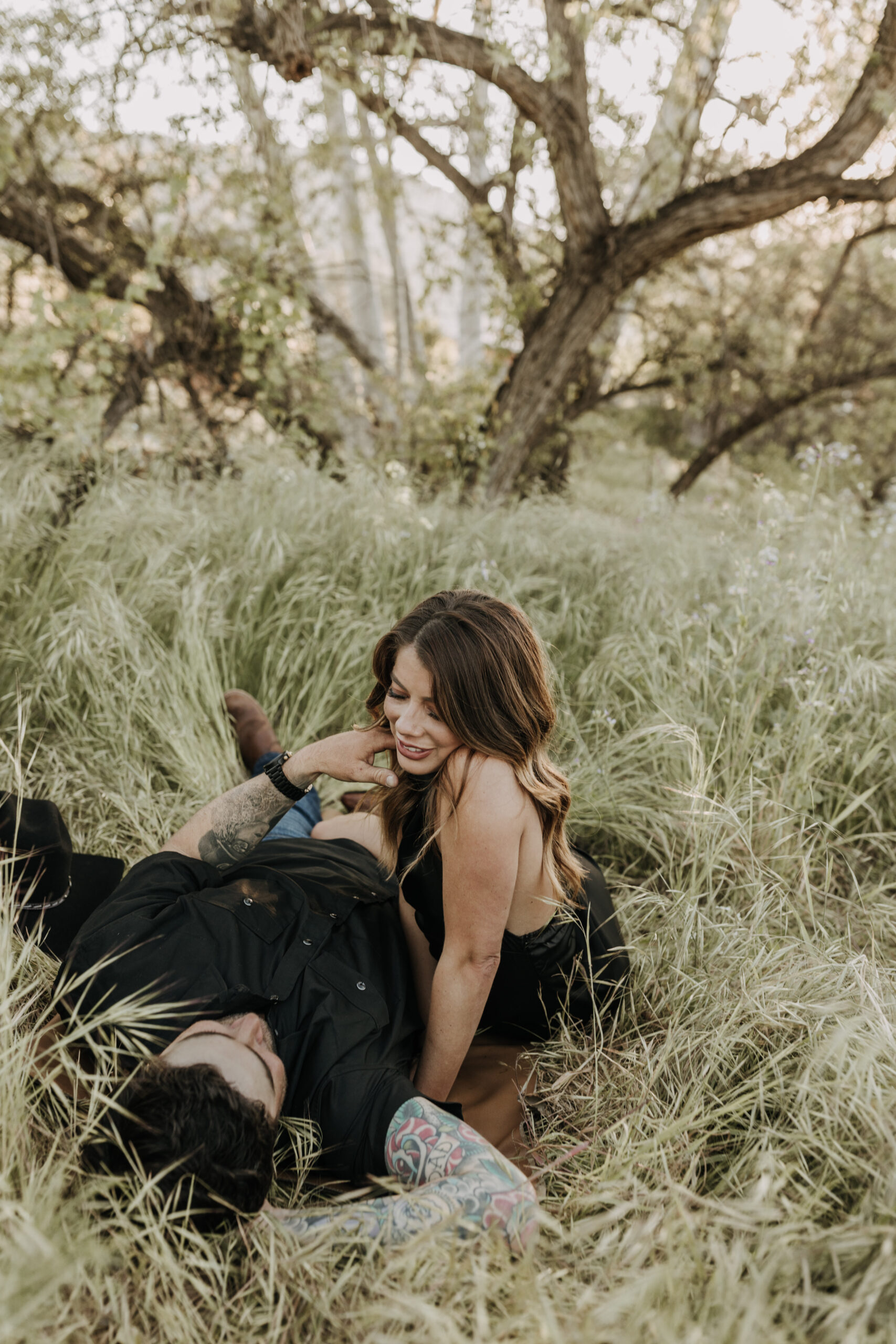 outdoor western romantic engagement session couples photography warm toned country cowboy modern couple bride and groom engagement San Diego couples photographer Sabrina kinsella sabrinalynnphoto