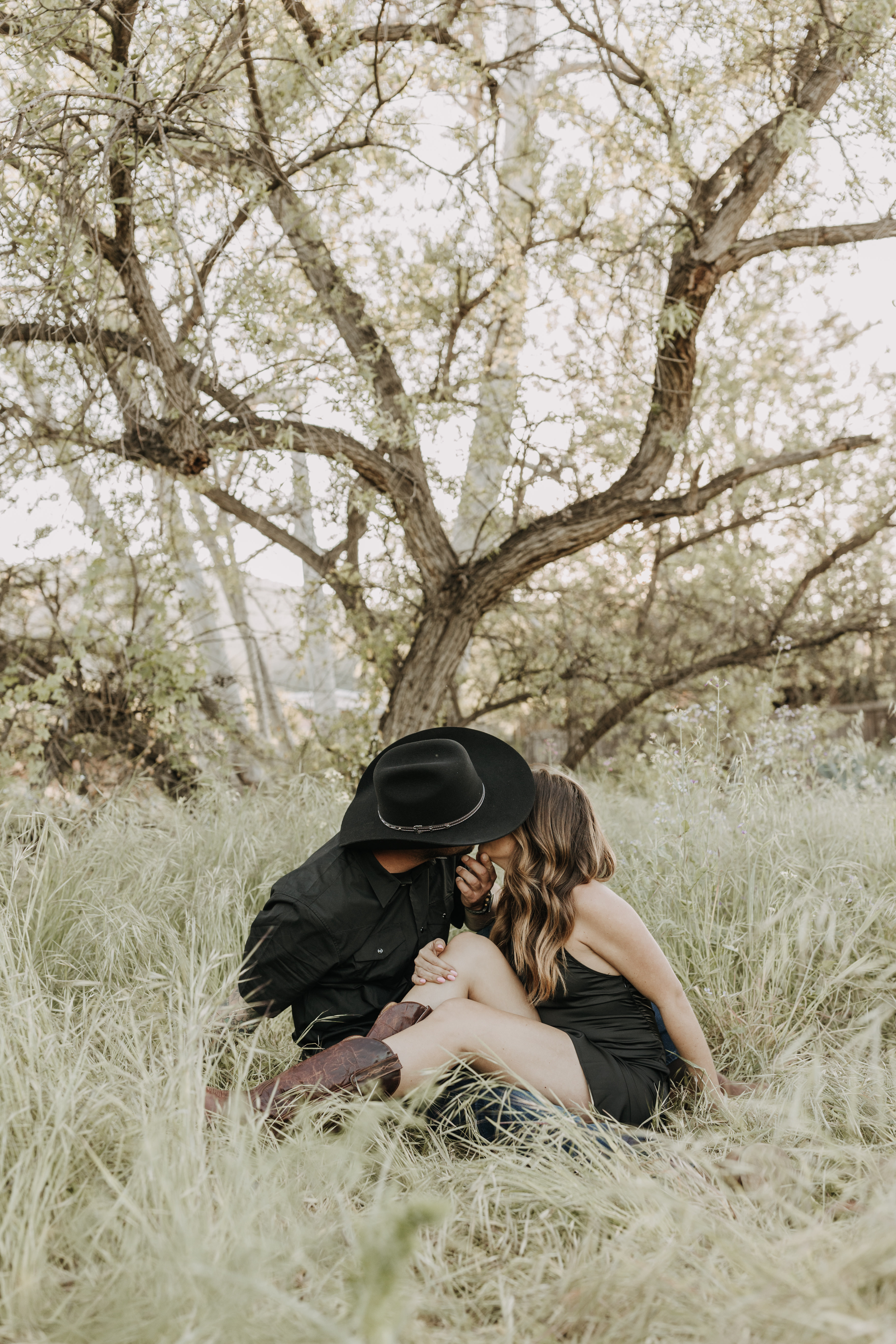 outdoor western romantic engagement session couples photography warm toned country cowboy modern couple bride and groom engagement San Diego couples photographer Sabrina kinsella sabrinalynnphoto