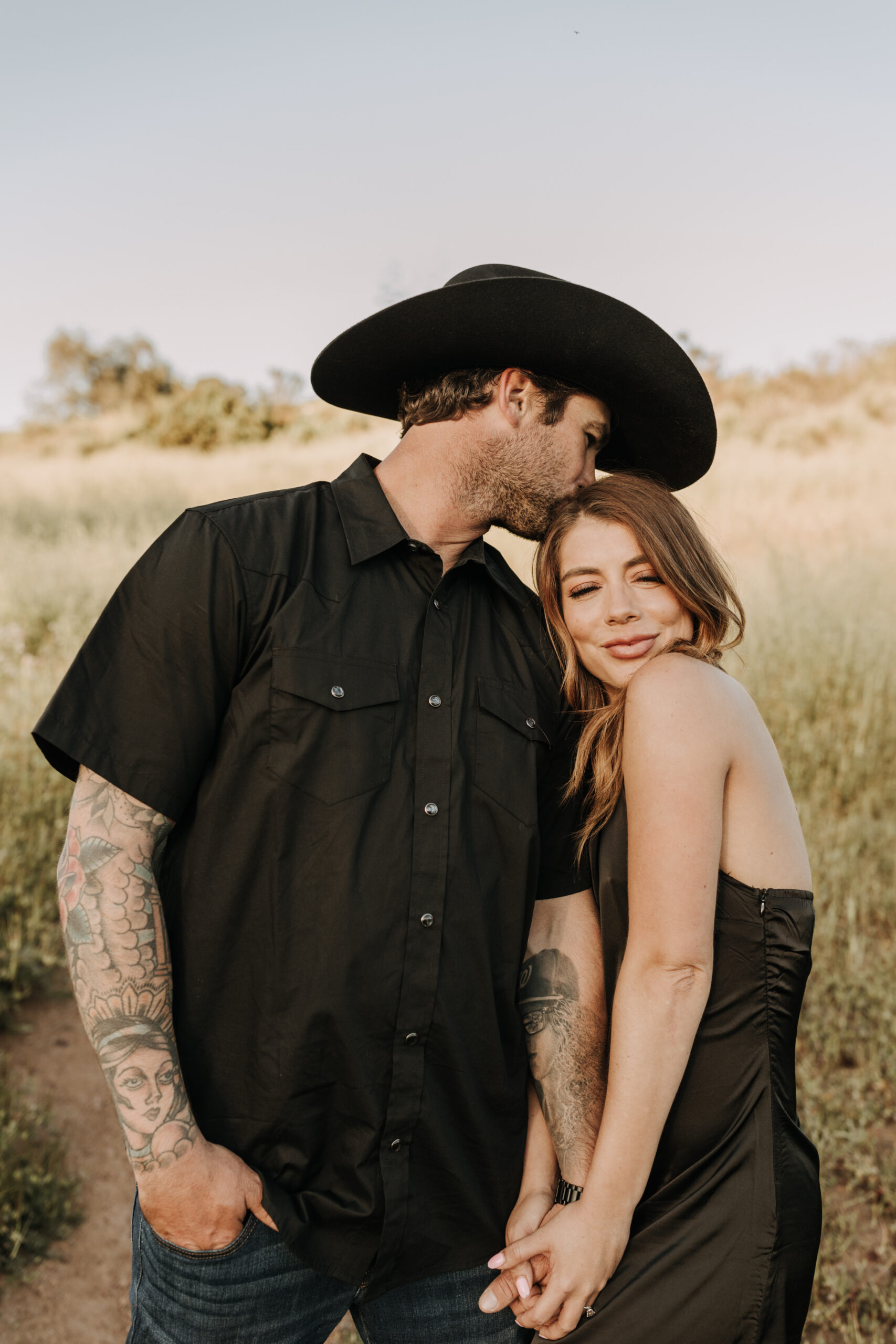 outdoor western romantic engagement session couples photography warm toned country cowboy modern couple bride and groom engagement San Diego couples photographer Sabrina kinsella sabrinalynnphoto