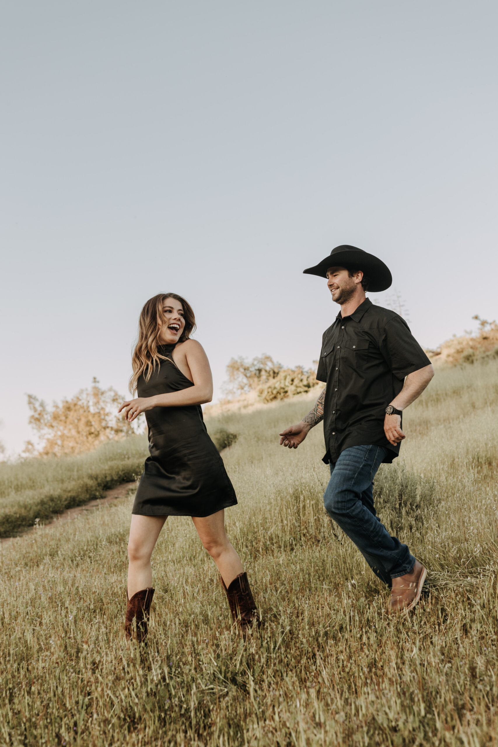 outdoor western romantic engagement session couples photography warm toned country cowboy modern couple bride and groom engagement San Diego couples photographer Sabrina kinsella sabrinalynnphoto