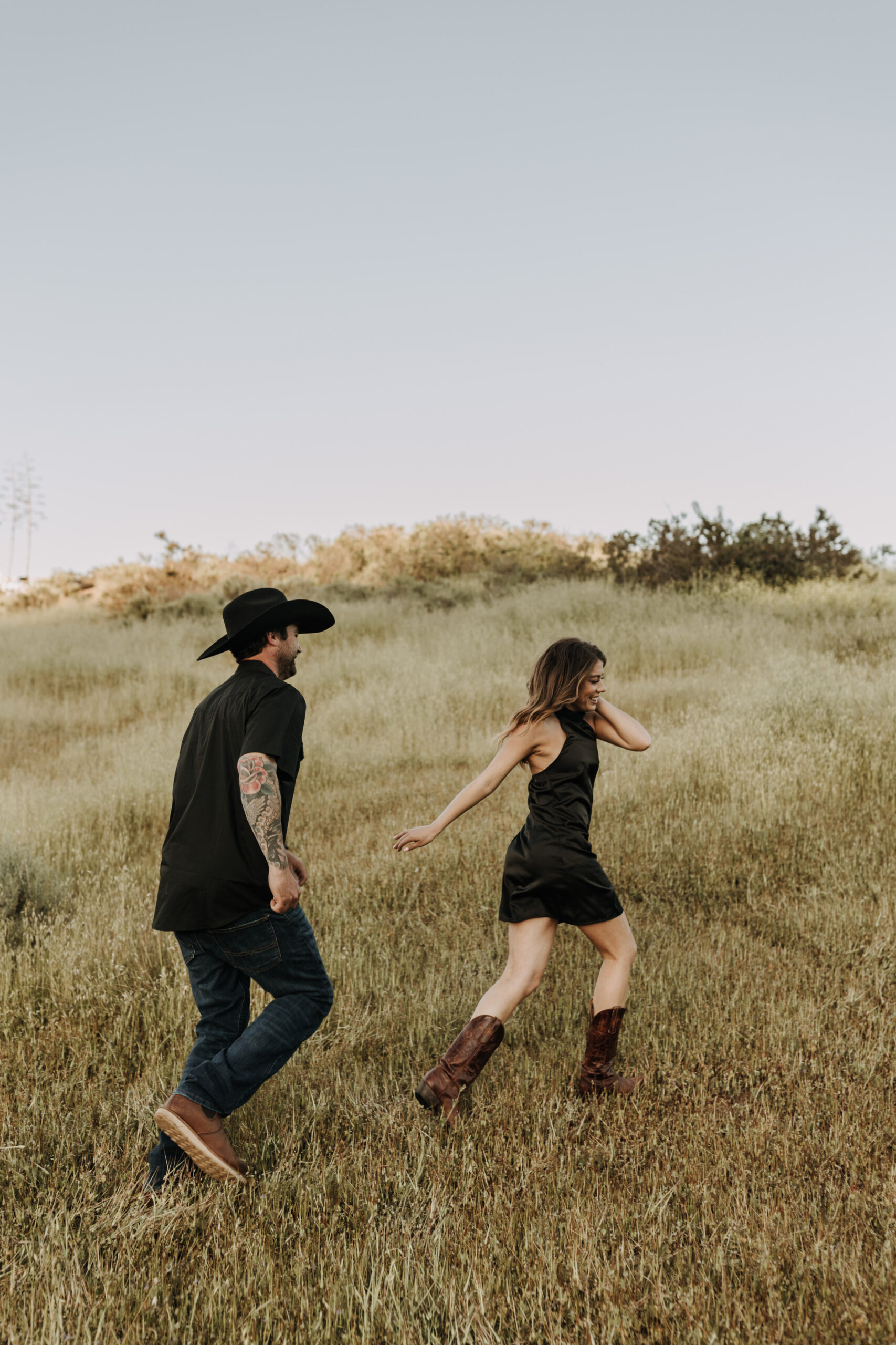 outdoor western romantic engagement session couples photography warm toned country cowboy modern couple bride and groom engagement San Diego couples photographer Sabrina kinsella sabrinalynnphoto