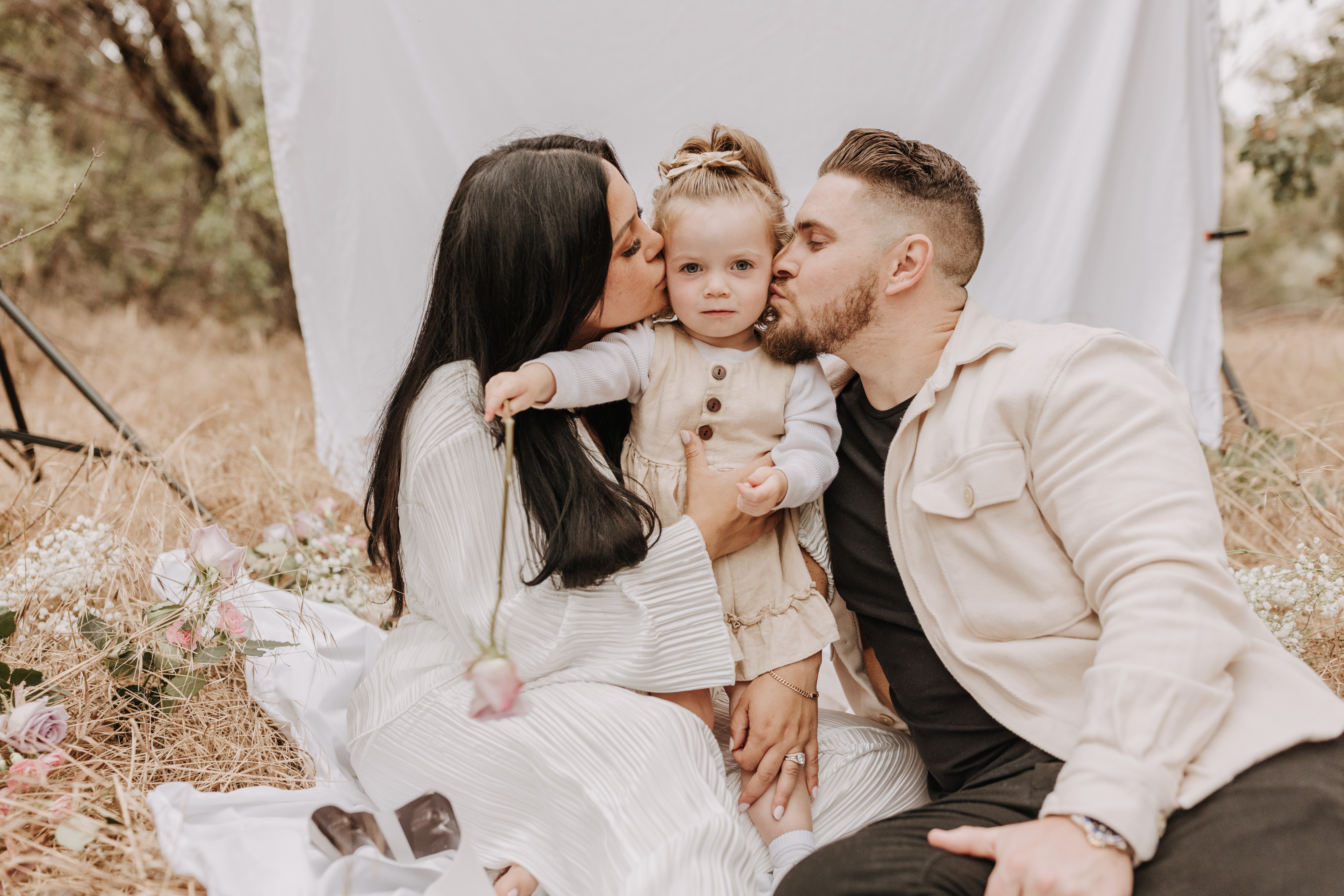 backyard mini white backdrop outdoor maternity session maternity photos family outdoor photos cloudy neutral tones all white theme canid family photos