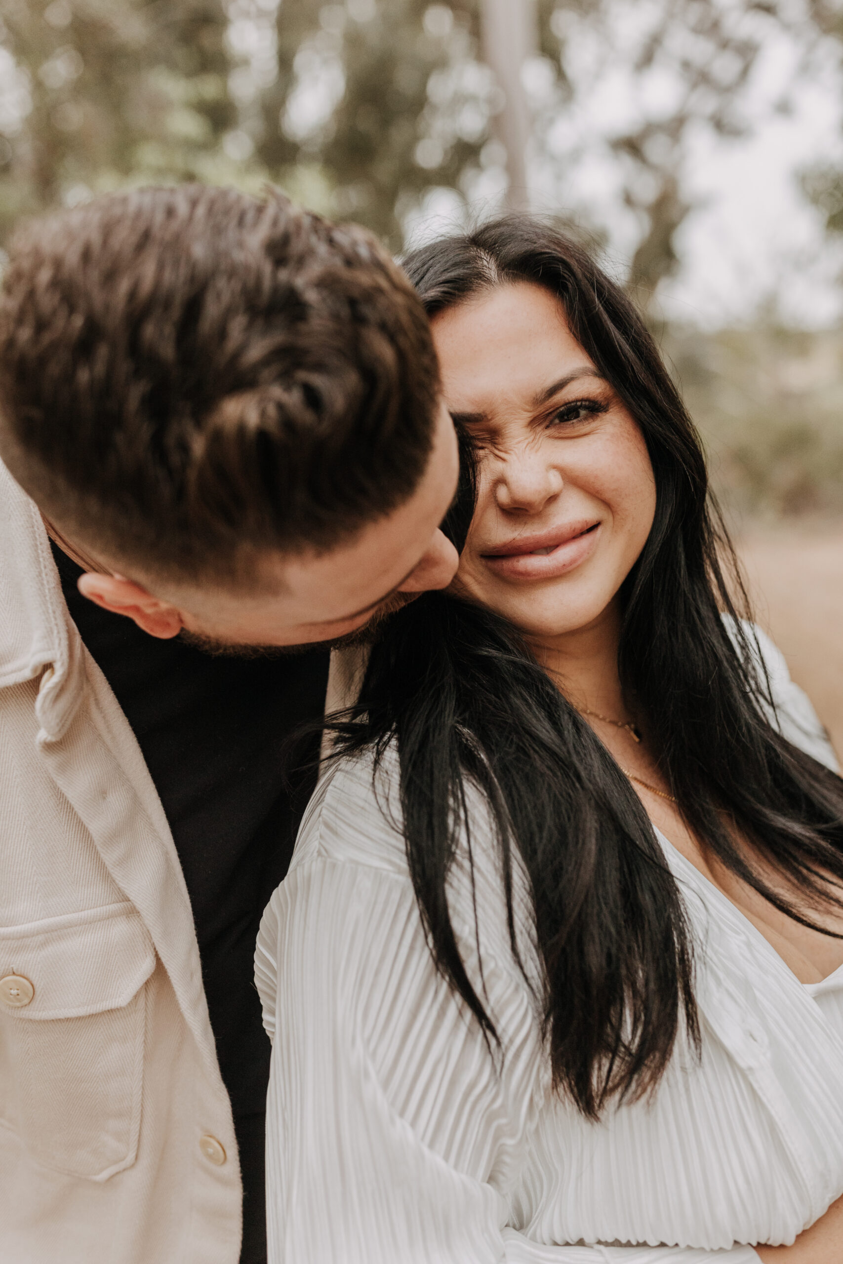 backyard mini maternity styled shoot San Diego family photographer neutral toned maternity photos candid outdoor family photos