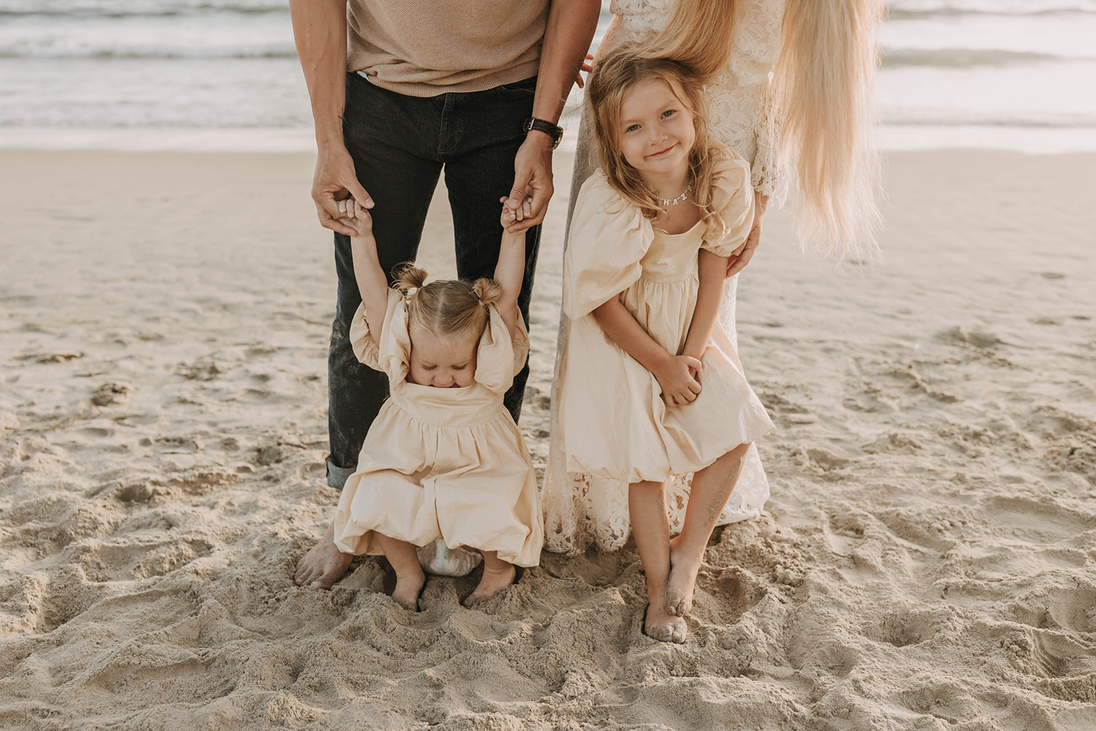 family photos at the beach with little ones