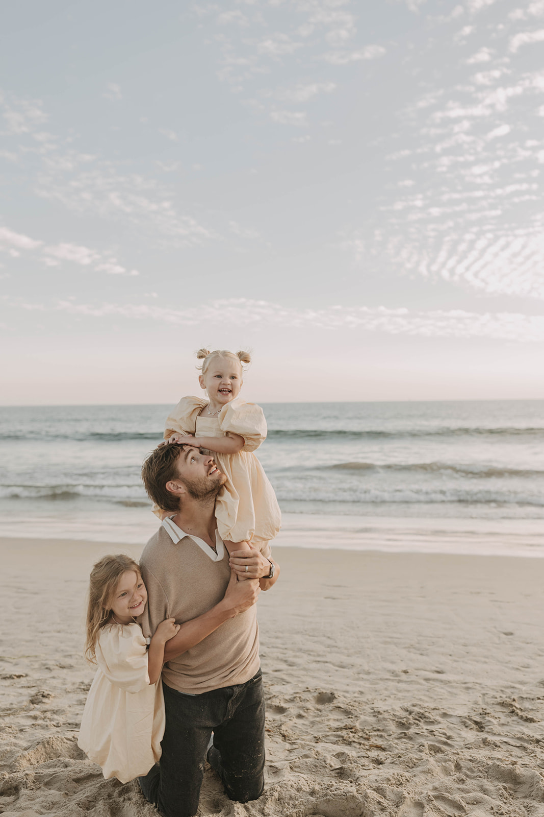 family photos at the beach with little ones