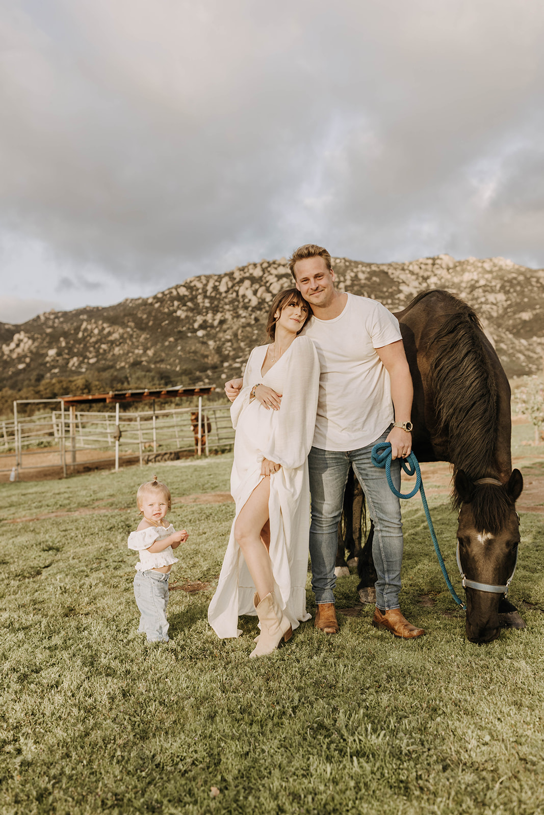 family maternity photoshoot with a horse