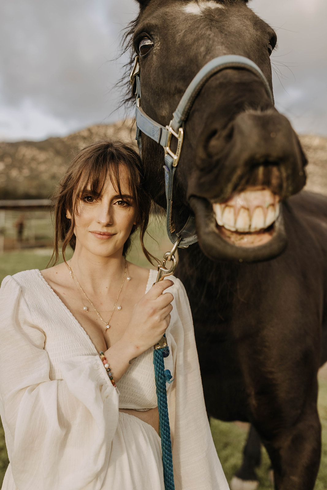 family maternity photoshoot with a horse