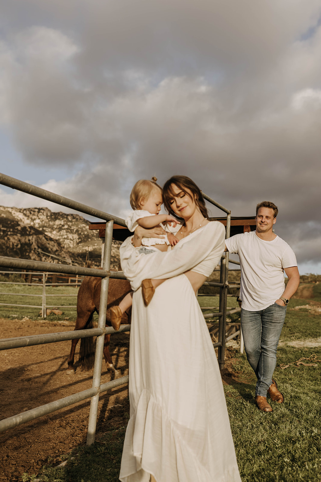 family maternity photoshoot with a horse