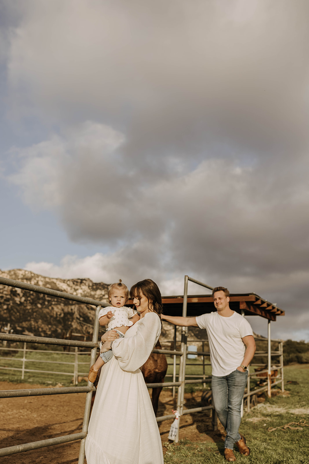 family maternity photoshoot with a horse