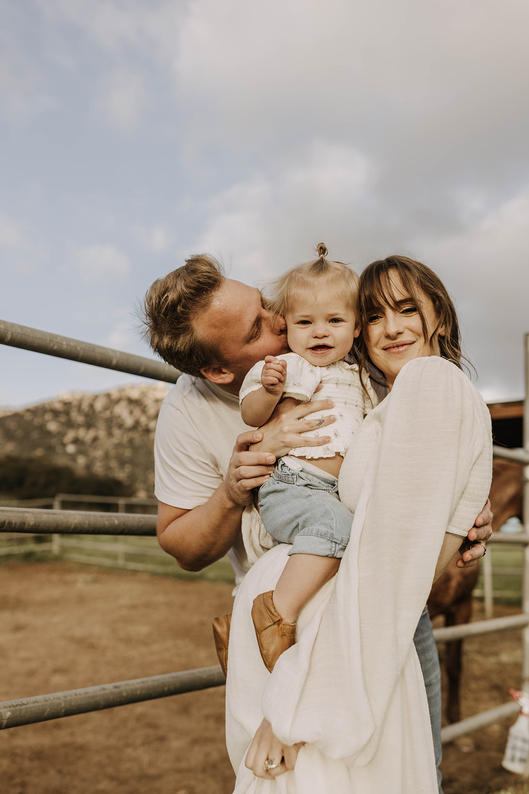 family maternity photoshoot with a horse